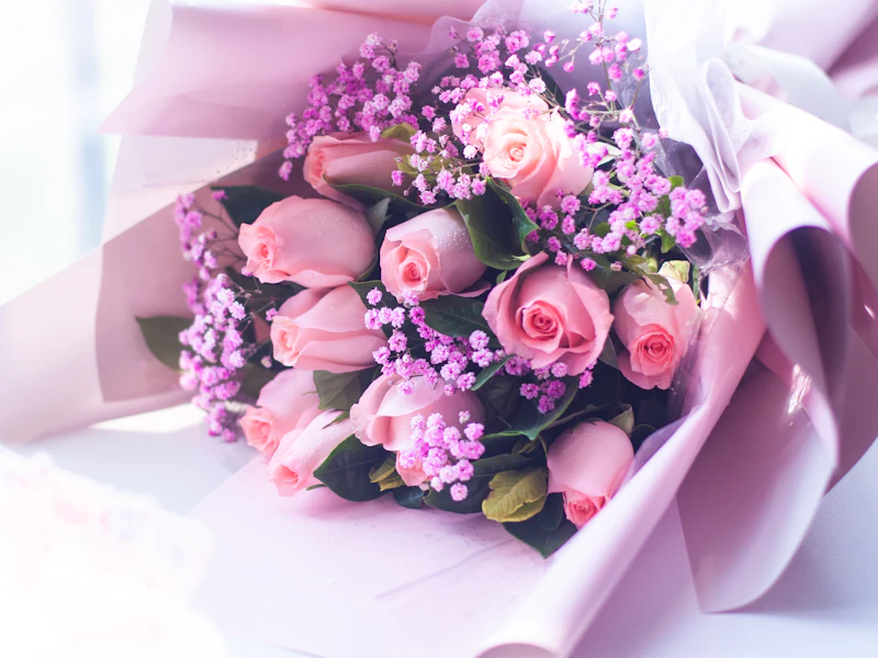Bó hồng hồng gói giấy hồng